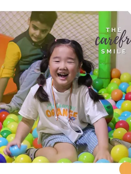This carefree smile says it all! We are all about creating moments of pure happiness and laughter for every child who walks through our doors.