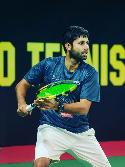 Locked in and focused during a Pro Tennis League match. Mental toughness is a critical component of our training program.