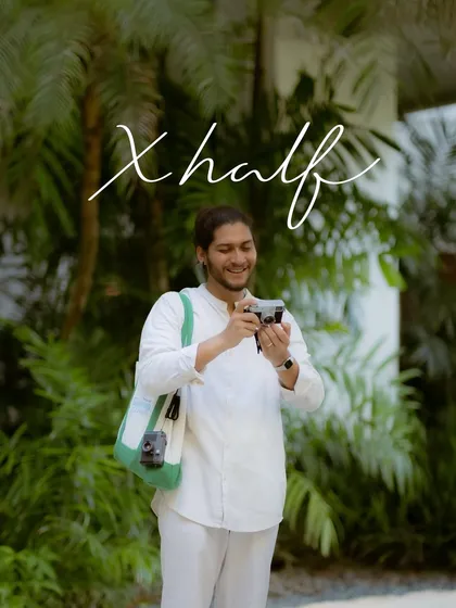 A candid shot from the Fujikina Cebu camera festival. This image captures the joy of using the new X half camera, blending the product naturally into the event's creative atmosphere.