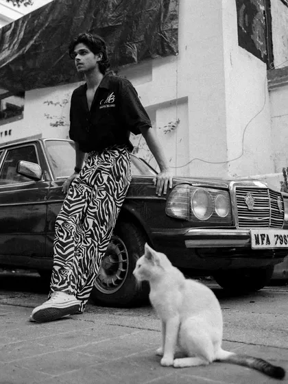 This series features a male model with a vintage Mercedes, shot in both color and black and white. It showcases a cool, retro vibe perfect for a fashion editorial or model portfolio.