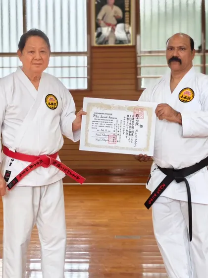 To ensure my teaching remains true to its source, I continue my own training in Okinawa. It was a great honor to receive my Kyoshi Nanadan (7th Degree Black Belt) certificate from my teacher, Hanshi Minoru Nakazato, at the Shorinkan Honbu Dojo.