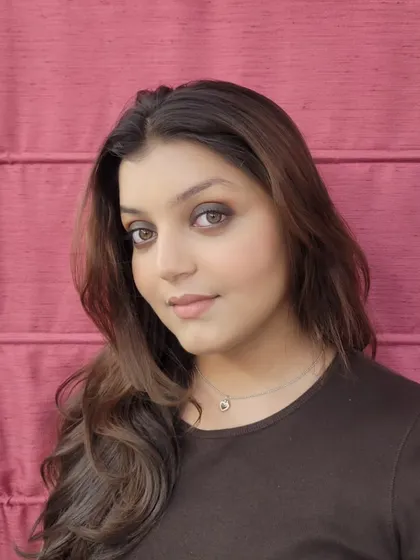 A classic brown smokey eye, which is a universally flattering choice for parties and events. The look is finished with soft contouring and a neutral lip to keep the focus on the eyes.