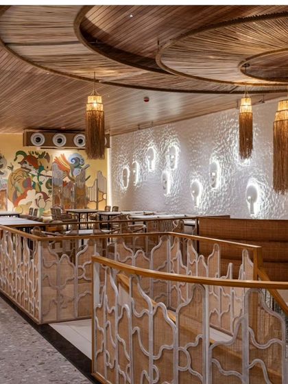 A Balinese-inspired haven in the heart of Ahmedabad for Pepito restaurant. This view shows our mural in context with other design elements like textured walls and rattan railings.