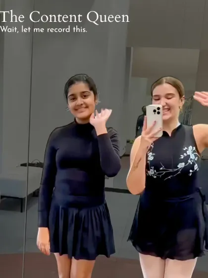 The Content Queen. "Wait, let me record this." She's always ready to capture the moment for the 'gram.