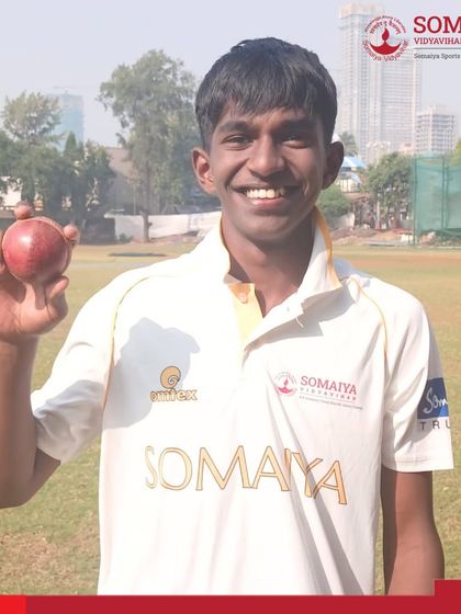 Manthan Mestry, a key bowler for our S K Somaiya Vinay Mandir Junior College team, proudly displays the cricket ball after taking 4 wickets for just 9 runs in a dominant victory.