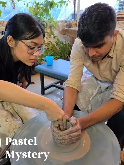 Here I am guiding a couple as they center the clay on the wheel together. It’s a moment of focus and teamwork, and the first step to creating something beautiful.