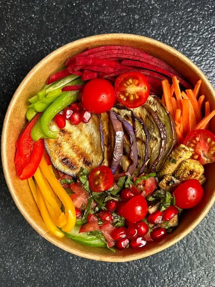The Fresco Greek Bowl is a light yet flavorful option. We include grilled pesto eggplant rolls, couscous, mixed vegetables, olives, and fresh lettuce for a refreshing taste of Greece.