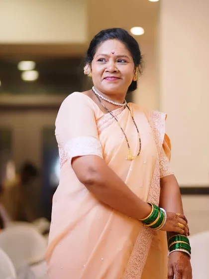An elegant look for a mature client. The makeup is soft and enhances her features, paired with a classic hairstyle.