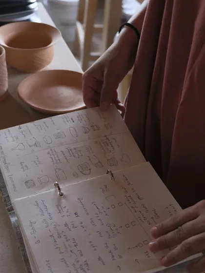 A look inside my notebook, where I plan lessons and track progress for my professional pottery course. The program is structured, rigorous, and hands-on, designed to help students build a body of work.