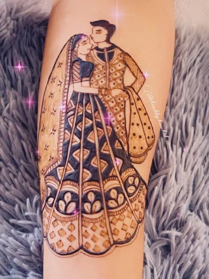 A beautiful bridal couple portrait on the forearm. I love capturing the love and connection between partners, creating a piece of art they can cherish for their special day.