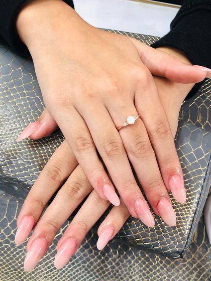 Simple, clean, and long extensions with a sheer pink polish. This is the perfect base for any art or just beautiful on its own.