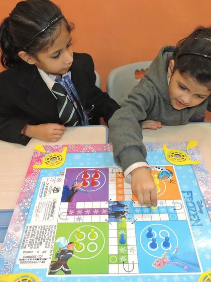 Students learn teamwork and friendly competition through board games during a day dedicated to non-digital activities.