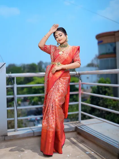 A bride should feel confident and radiant. Here, you can see how the saree drape complements the intricate jewelry and allows for graceful movement, which is something I always prioritize.