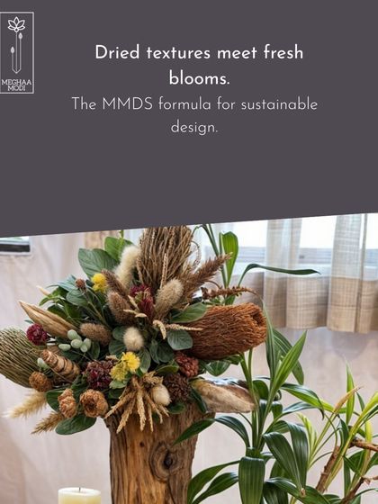 Dried textures meet fresh blooms in this sustainable design. I teach my students how to combine elements to create long-lasting and eco-conscious arrangements.