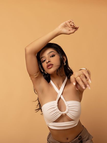 A final shot from this series, combining grace and strength. This pose captures the feeling of reaching and expressing through movement.