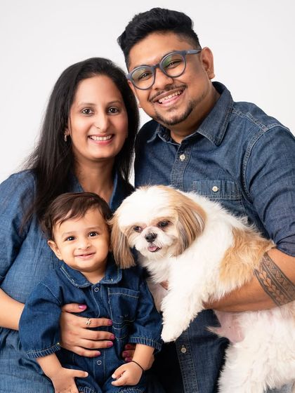 A beautiful family portrait including their beloved Shih Tzu. Twinning in denim, this family's love for each other and their fur baby shines through.