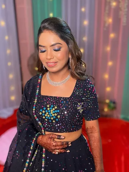 A close-up of the bride's colorful and glamorous makeup. The look is bold and beautiful, perfect for a themed party.