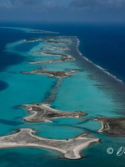 An aerial view shows the incredible geography of the Maldives, a chain of coral atolls stretching across the Indian Ocean. This is our playground, and we know its secrets.
