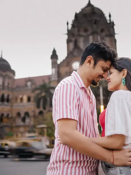 A quiet embrace amidst the motion of Mumbai. This shot, taken in front of the historic CST station, freezes a personal moment in time, contrasting the couple's stillness with the city's vibrant energy.