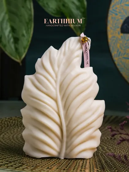 Inspired by nature, this White Leaf Candle is a simple yet elegant statement piece that brings a touch of the outdoors inside.