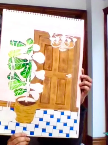 An instructor holds up a work-in-progress showing an interior scene. We teach perspective and composition, helping you draw and paint the world around you.