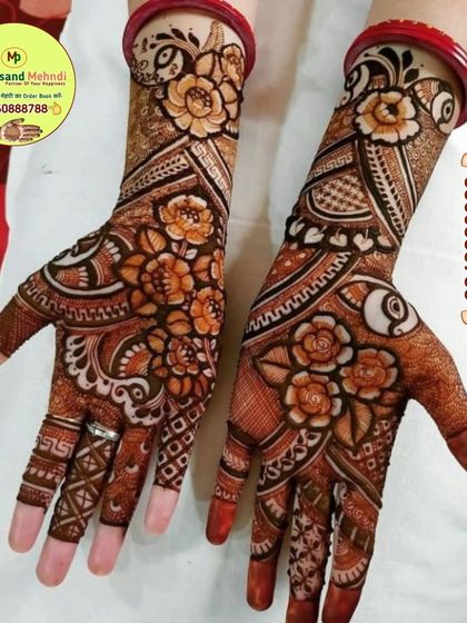 A beautiful floral design with a mix of bold flowers and delicate patterns. This is a versatile look that is perfect for any festival or celebration.