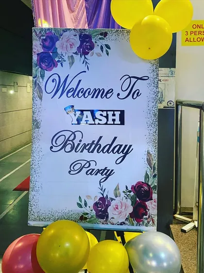 Another view of the elegant welcome sign at the entrance of the birthday party.