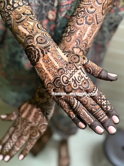 A close-up of the phrase 'Qubool Hai' which means 'I accept'. It's a popular and meaningful addition for many of my brides, and I take great care to make it a beautiful centerpiece.