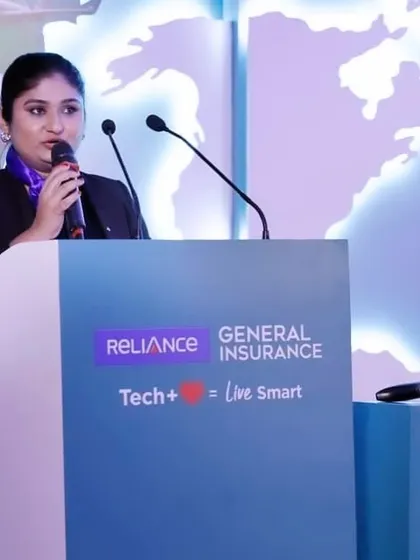 At the podium for Reliance General Insurance, ready for takeoff. I love committing to an event's theme.