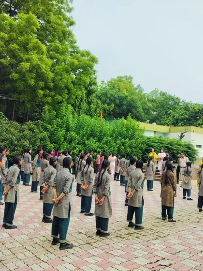 A group of school girls stands ready to learn during our self-defense awareness program. Teaching the next generation how to be aware and safe is incredibly important.
