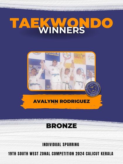 Avalynn Rodriguez on the podium after winning a Bronze medal in Individual Sparring. We are proud to see our young female athletes excelling in competitive martial arts.