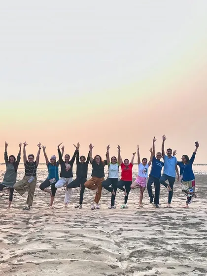 The joy of our yoga community at sunset on the beach during a retreat. These are the moments we cherish, connecting with ourselves and with each other.