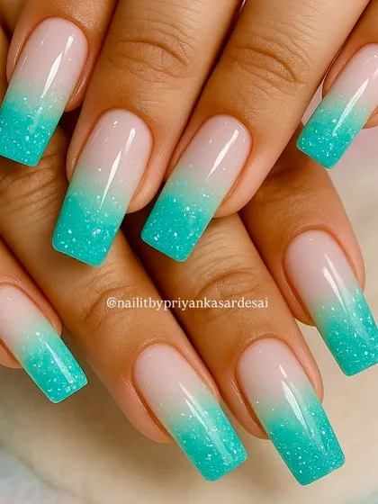Showing off the magic of airbrush art with this flawless glitter ombré. I blended a milky nude base into a sparkling turquoise tip for a clean, modern, and eye-catching look on these long square nails.