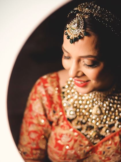 A radiant bride glowing during her reception. The makeup was designed to be timeless and beautiful, ensuring she loves her photos for years to come.