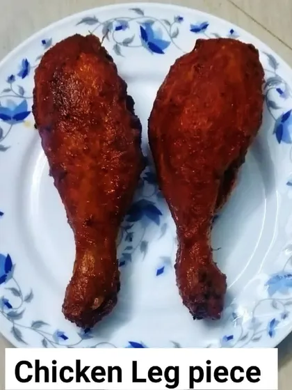 A classic non-veg starter: crispy fried chicken leg pieces, marinated with spices for a flavorful bite.