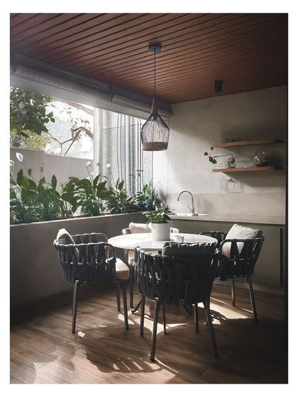 The deck is equipped with an open pantry and sink, making outdoor entertaining effortless.