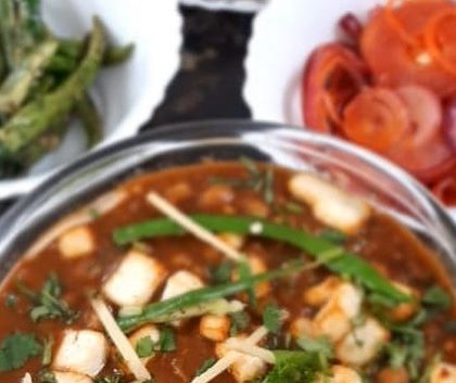 A top-down view of our delicious chole, ready to be enjoyed with hot bhature or rice.