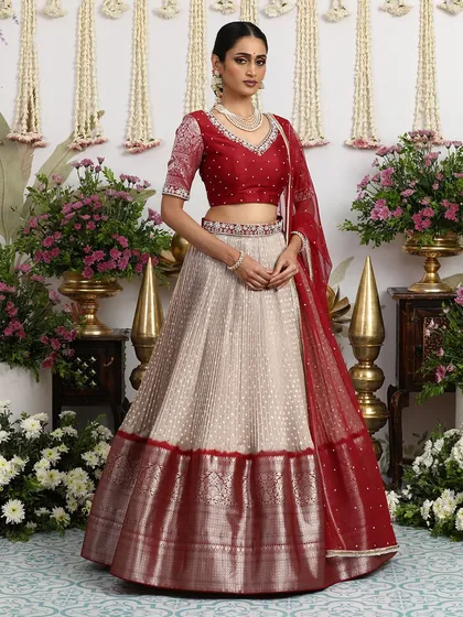 The complete look, with the dupatta elegantly draped, is a picture of grace and sophistication.