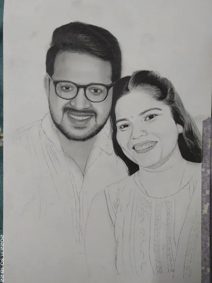 A progress shot of the couple's portrait. The man's face is fully shaded, and I have started adding detail to the woman's face and hair.