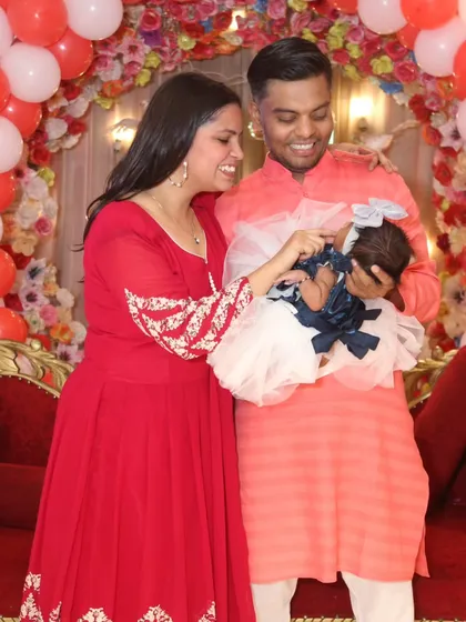 A candid, heartwarming photo of the new parents adoring their baby girl. These are the quiet, emotional moments that I strive to capture.