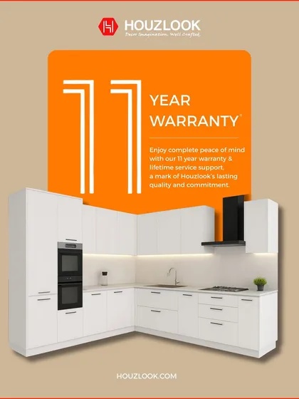 Our commitment to quality is backed by an industry-leading 11-year warranty and lifetime service support. This graphic highlights our promise on a sleek, L-shaped modular kitchen, assuring you that your investment is protected for over a decade.