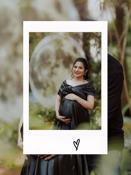 A polaroid-style portrait of the mother-to-be, with the giant moon prop creating a dreamy background.