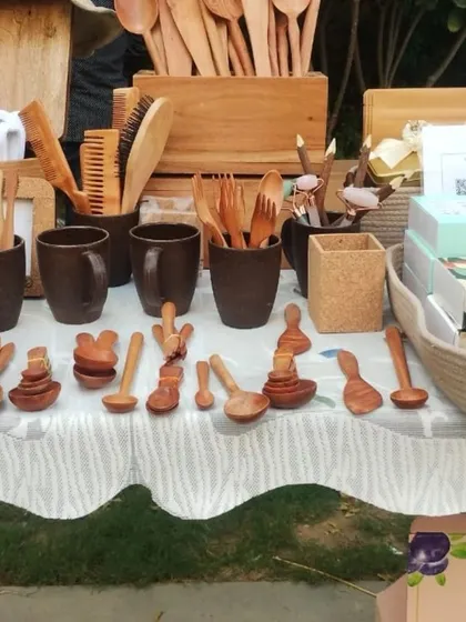 A beautiful display of handcrafted wooden cutlery, including spoons, forks, and spatulas.