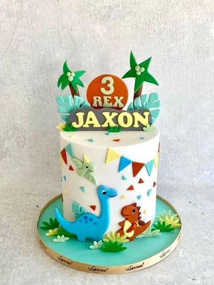 It's a 3-Rex party! A cute and colourful dinosaur-themed cake for Jaxon's third birthday.