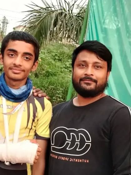 Nirvikar with his coaches, proudly holding his gold medal despite an injury. This shows the resilience and "unstoppable attitude" we instill in our children.