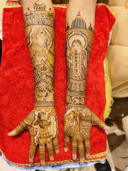 A divine theme featuring portraits of gods and goddesses on the arms, with a bride and groom playing musical instruments on the palms.