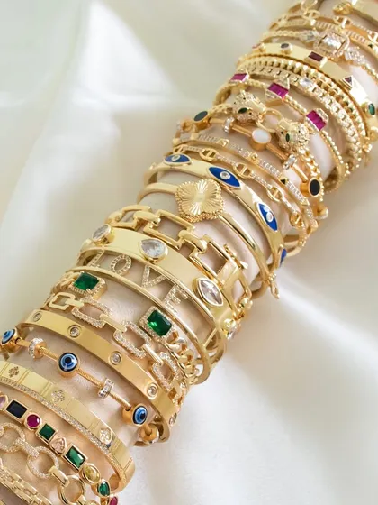 Mix, match, and stack with my wide range of bangles. This image shows just a fraction of the collection, with styles for every taste.