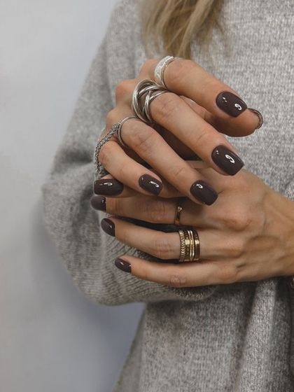 A deep, chocolatey brown on square-shaped nails. It's a perfect neutral shade for the colder months.