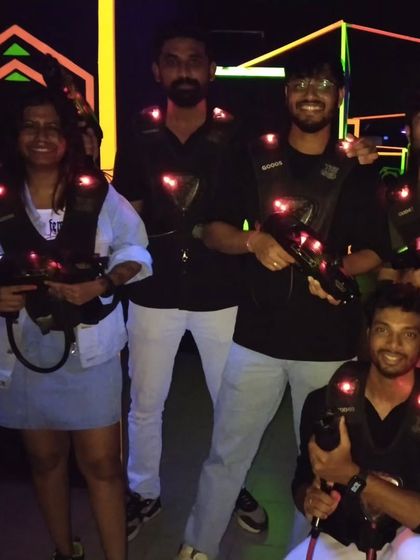 Our hourly packages are a crowd favorite, perfect for team outings. This team is enjoying a game of laser tag.
