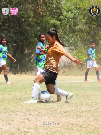 A powerful moment as our player winds up to take a shot or make a long pass during a competitive match.